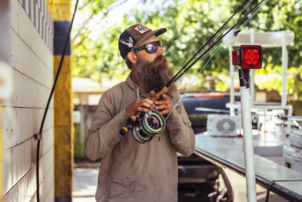 Court Douthit with his fishing reel