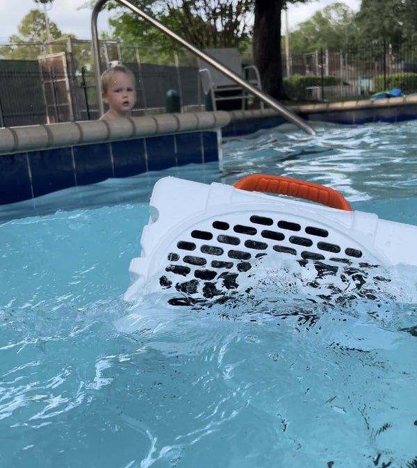 Turtlebox floating in the pool