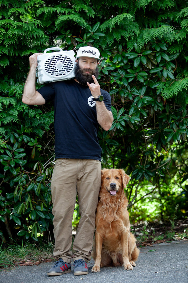 Ambassador Eric Jackson with his Turtlebox and dog