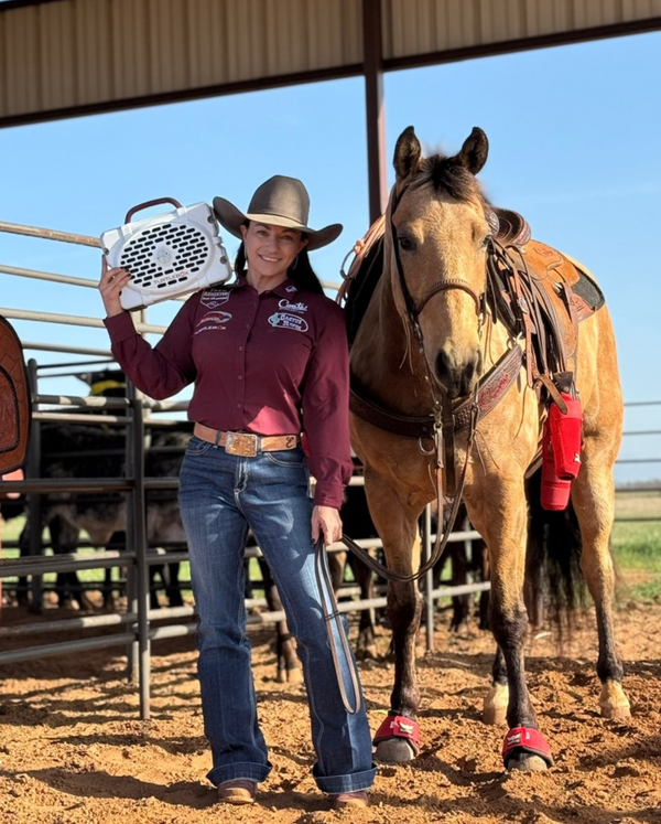 Erica Krantz with her white Turtlebox and her horse