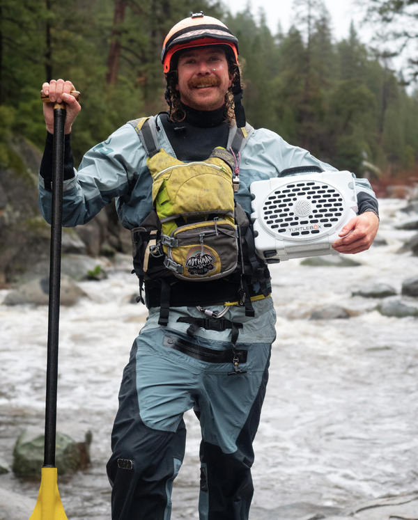 Blake Higman, Whitewater ambassador, with his White Original Turtlebox