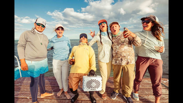 Friends gathered listeniing to music on the Turtlebox