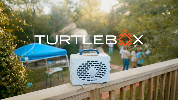 Turtlebox playing music at a backyard party