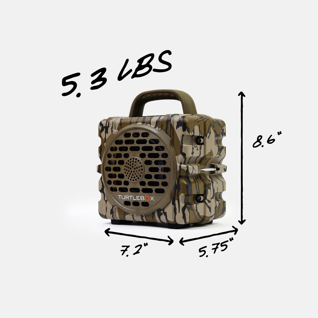 A compact portable speaker in a tan and brown camouflage pattern, shown with dimension lines and text indicating its size (7.2 x 5.
