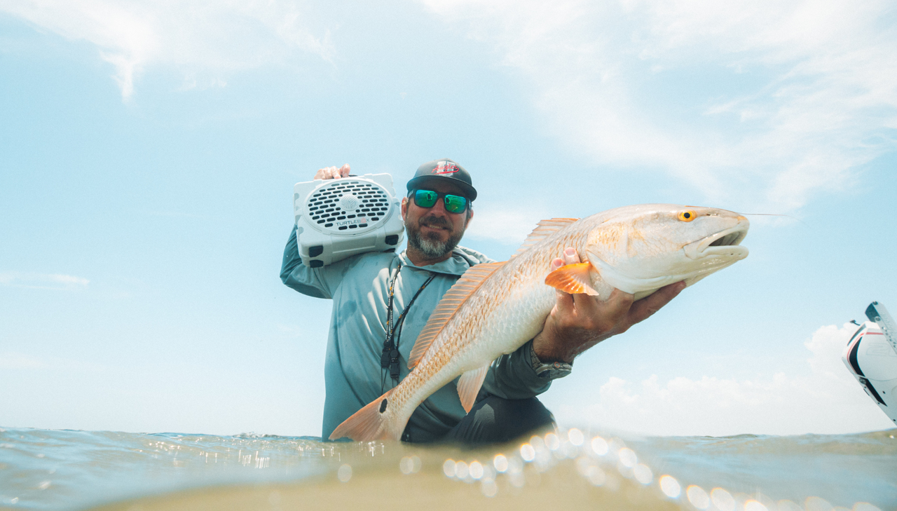 Caleb McCumber fishing with his Turtlebox