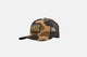 Studio side shot of the Everyday Camo Trucker Hat