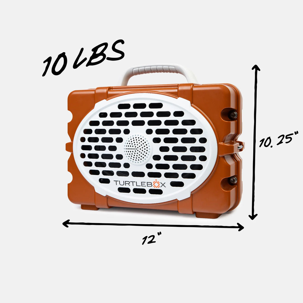 An orange and white Turtlebox portable speaker shown with dimension arrows and text indicating 12 inches wide, 10.25 inches tall, 10 lbs, on a light gray background.