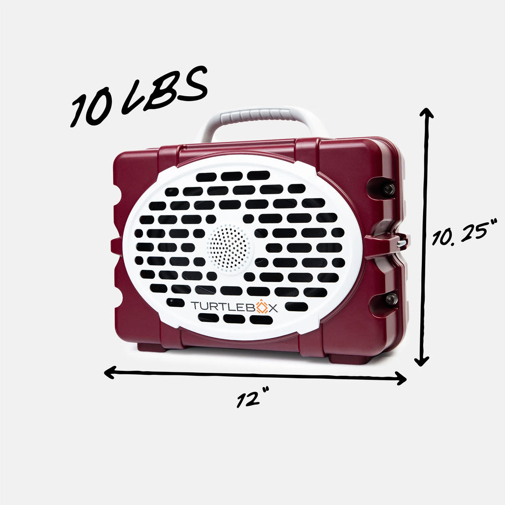 A maroon and white TurtleBox portable speaker shown with dimension arrows and handwritten text indicating 12 inches wide, 10.25 inches tall, and 10 lbs.