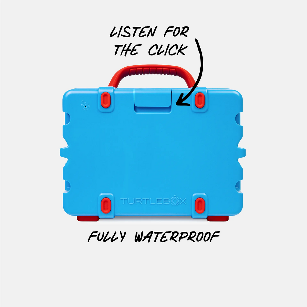 A bright blue hard-shell carrying case with red accents, shown from the front on a light gray background. Handwritten text above says 'LISTEN FOR THE CLICK' with an arrow pointing to the red handle/latch area, and text below says 'FULLY WATERPROOF.