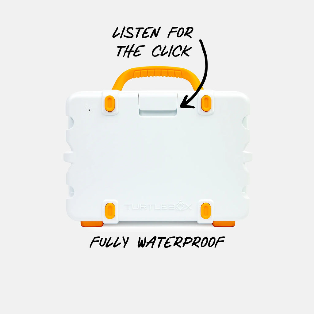 A white Turtlebox hard case with orange accents and a top handle, shown on a light gray background with text reading 'LISTEN FOR THE CLICK' and 'FULLY WATERPROOF'.