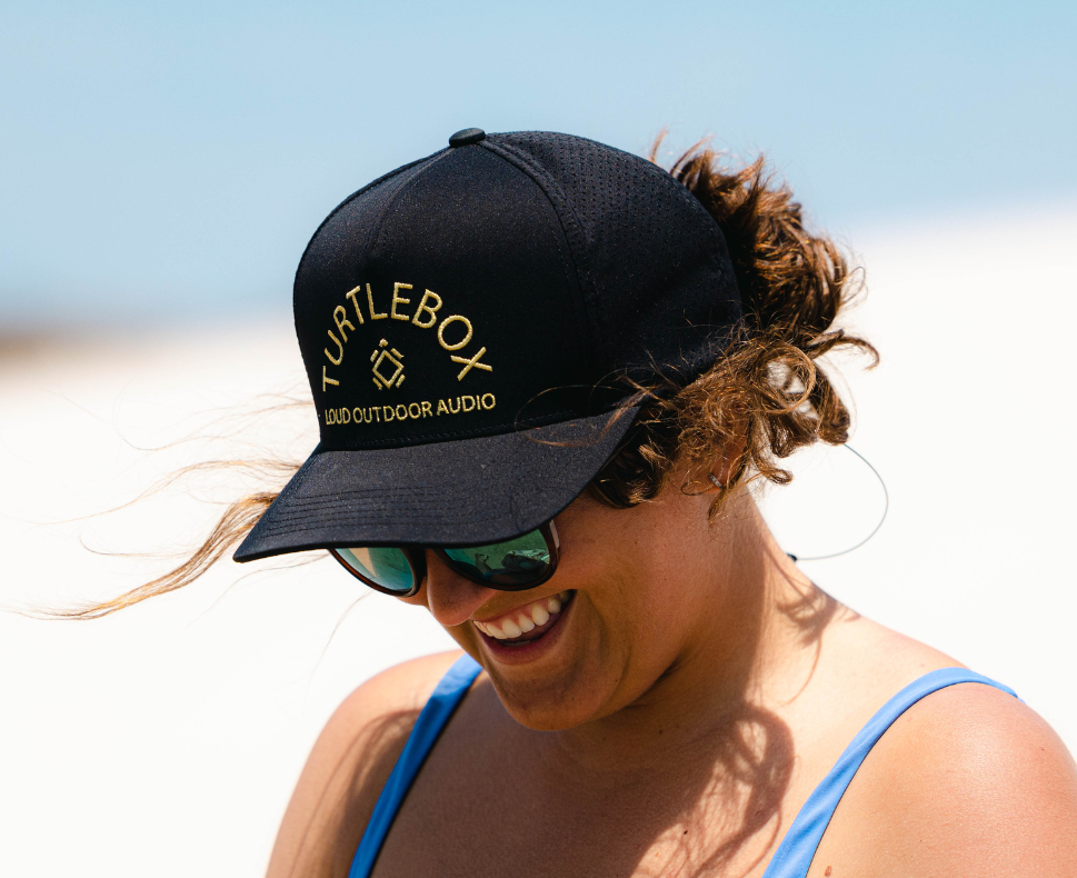 Lifestyle photo of a woman wearing a Bossman Hat