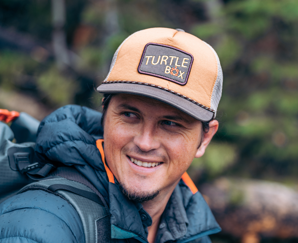 Lifestyle photo of a man wearing the Old School Hunter Hat