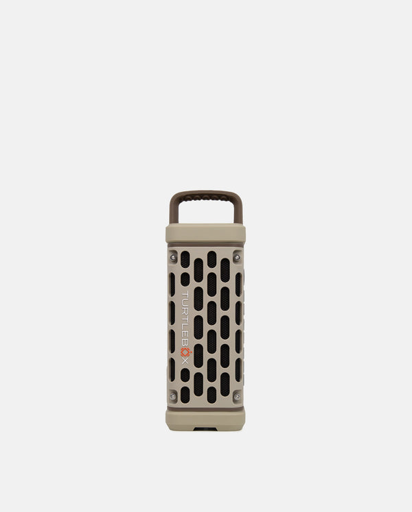 Portable grill with a handle on a light gray background