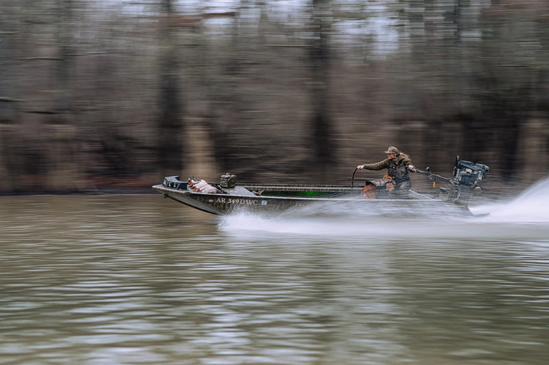 Maggie Williams in the marsh on her boat