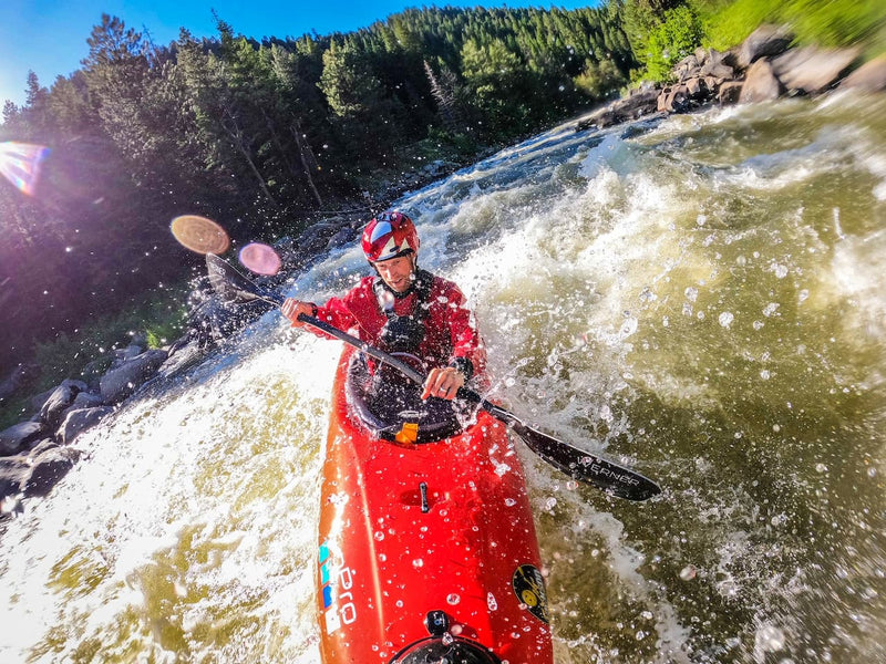 World Champion Kayaker, Nick Troutman, paddling down the rapids