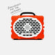 Turtlebox Original speaker in orange front view with a label saying Engineered for the Outdoors #speaker-color_orange
