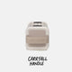 Studio top shot of a Ranger in Ivory color with a label that says Carryall Handle #base-color_ivory