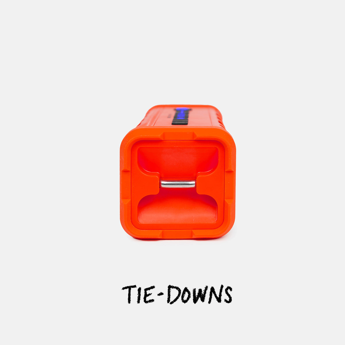Studio shot showing the Ranger Orange speaker's back with a label that says Tie-Downs #base-color_orange