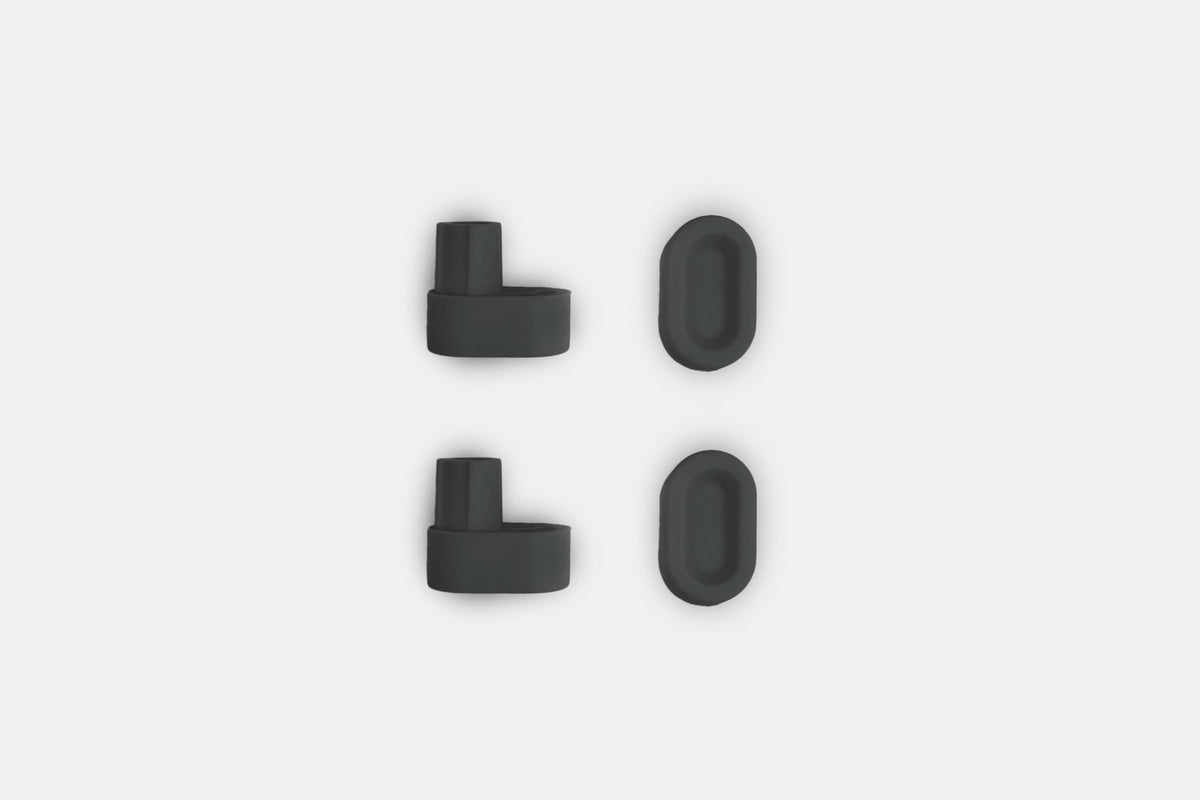Studio photo showing the gray rubber feet on a white background #feet-color_gray