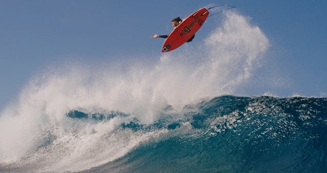 Matt Meola surfing