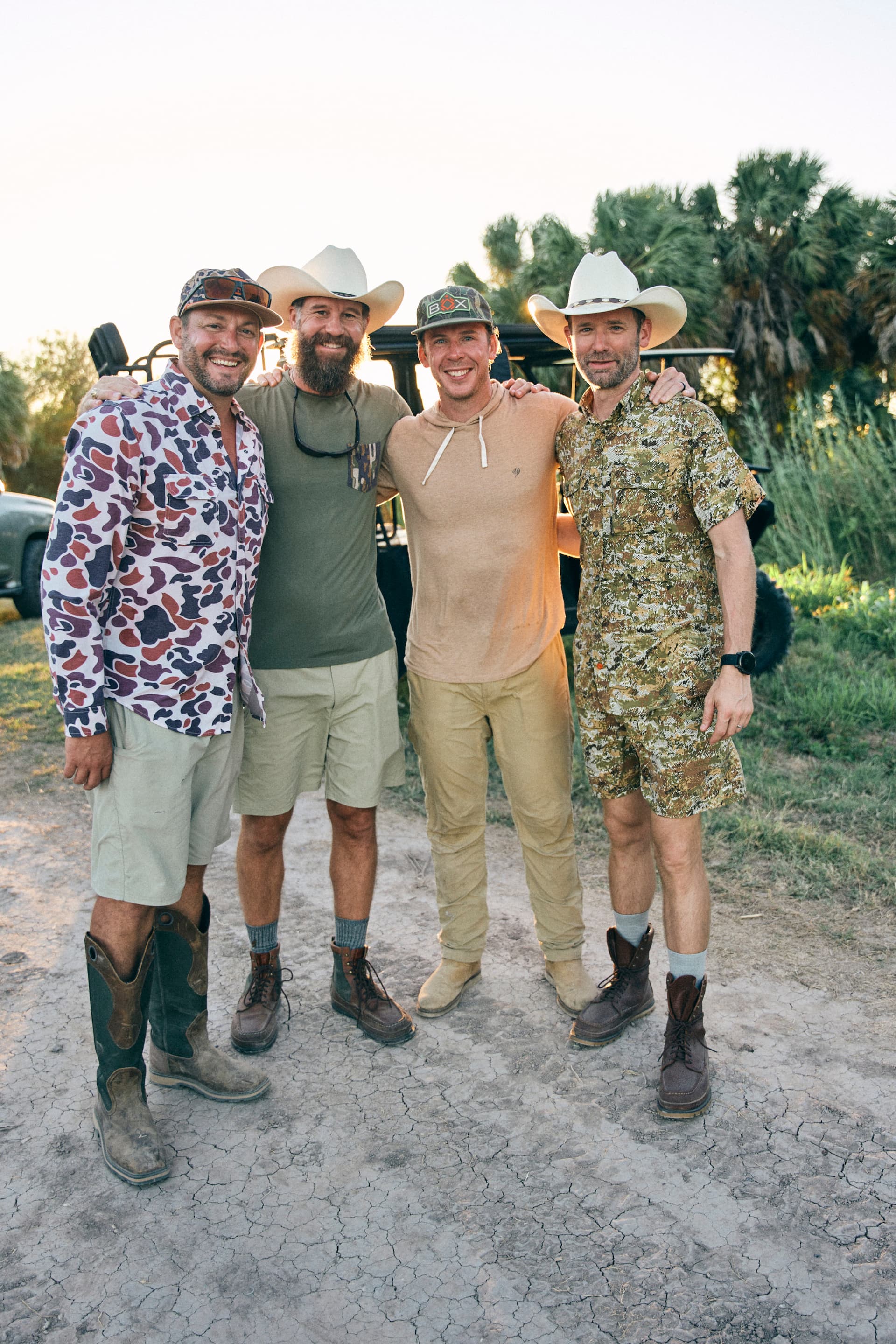 Image of the four Turtlebox Founders, Will, Jeff, Jonathan & Reagan standing with their arms around each other.