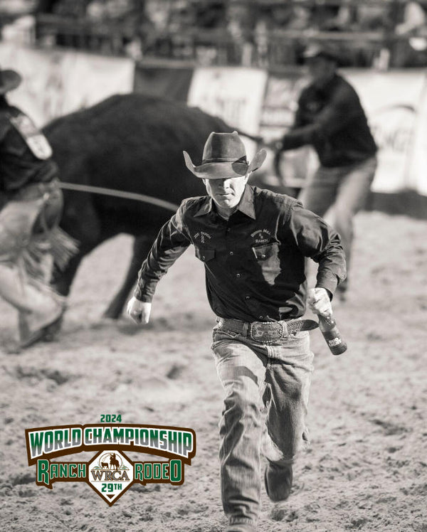 Cowboy running away from a bull with the 2024 World Championship Ranch Rodeo logo.