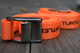 lifestyle photo of 2 orange straps with a wooden background