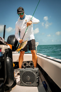 Michel Letchworth fishing with a Turtlebox on his boat.