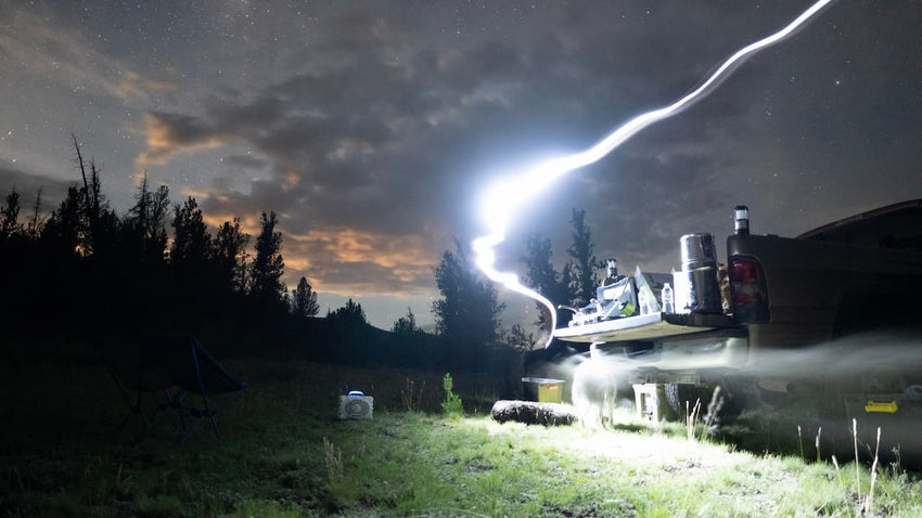 A thunder in the sky and a field with the White speaker in the middle