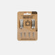 Turtlebox lifestyle anchor kit packaging with screws on a beige background