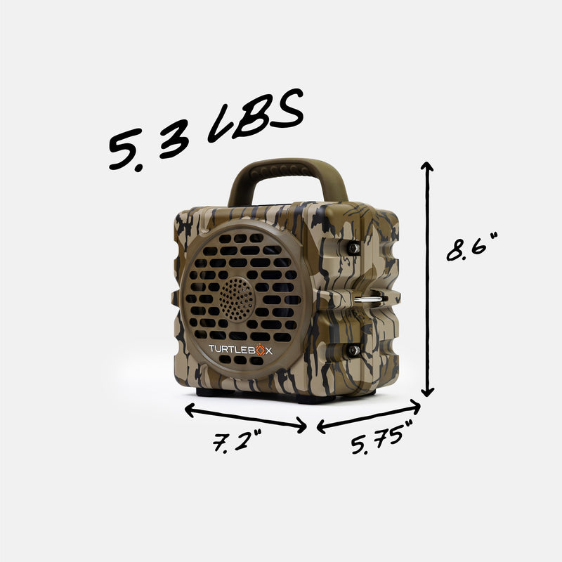 A compact portable speaker in a tan and brown camouflage pattern, shown with dimension lines and text indicating its size (7.2 x 5.