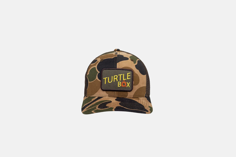 Studio front shot of the Everyday Camo Trucker Hat