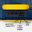 Close-up of the control panel on a Blue & Maize Turtlebox speaker, showing buttons for Bluetooth connectivity, 2-box stereo pairing, and party mode, with callout labels pointing to each feature.