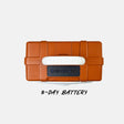 An orange hard-sided portable power station with a white handle and a black front control panel, shown from above on a light gray background with the text '3-DAY BATTERY' underneath.