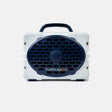 A white and navy blue portable speaker by Turtlebox, featuring a circular front grille with the brand name printed on it, set against a light gray background.