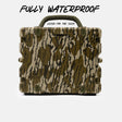 A rugged hard-shell case with a brown, beige, and black camouflage pattern, featuring a top handle and the text 'FULLY WATERPROOF' above it on a light gray background.