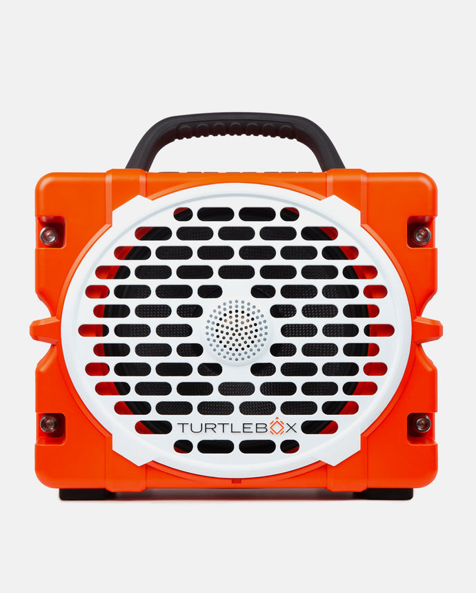 Orange and black portable speaker with 'TurtleBox' branding on a white background