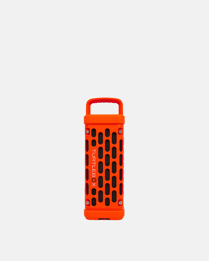 Orange portable device with handle on a white background