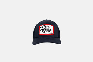 Studio front shot of the Live Free Patch Blue Hat