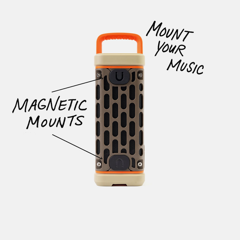 Studio shot of a Delta Ranger speaker calling out Mount your Music and showcasing the magnetic mounts.  #base-color_delta