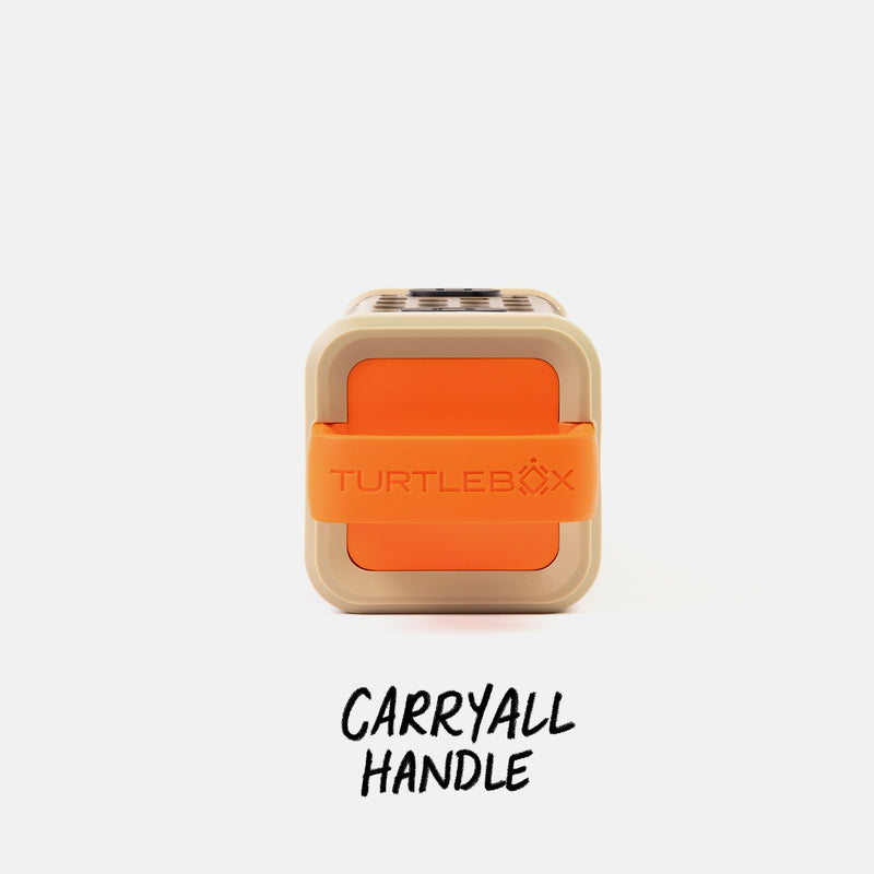 Studio top shot of a Delta Ranger speaker with a label that says Carryall Handle #base-color_delta