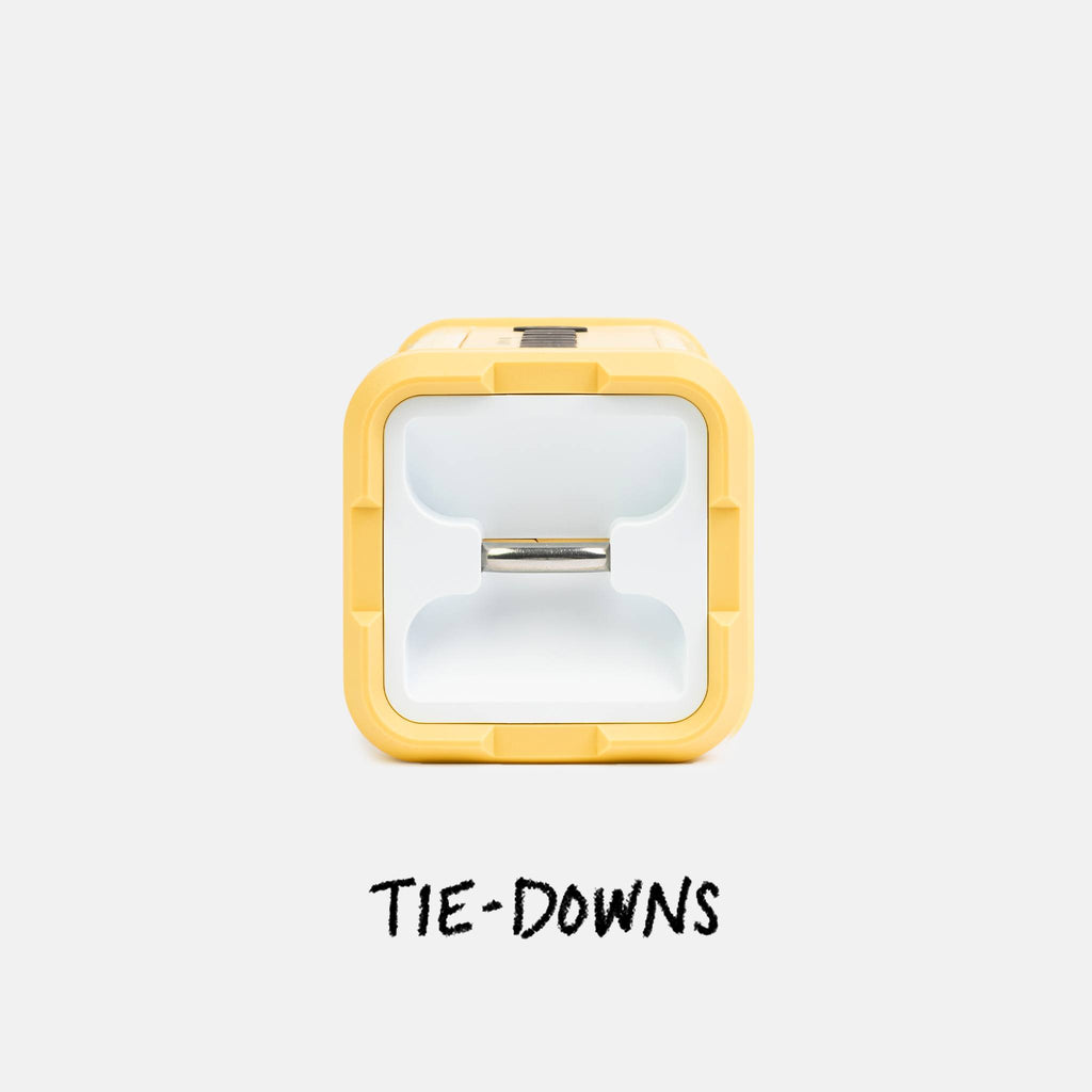 Yellow tie-down with a white interior on a light gray background, labeled 'TIE-DOWNS'. #base-color_fighting-lady-yellow