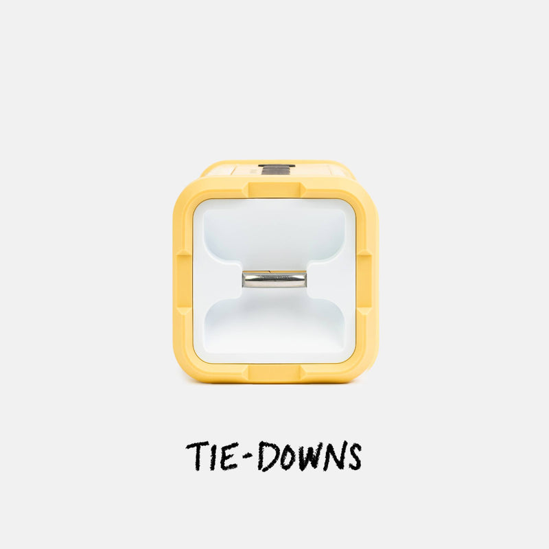 Yellow tie-down with a white interior on a light gray background, labeled 'TIE-DOWNS'. #base-color_fighting-lady-yellow