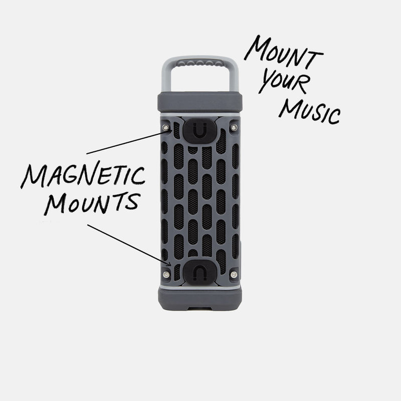 Studio shot of a Gray Ranger speaker calling out Mount your Music and showcasing the magnetic mounts. #base-color_gray