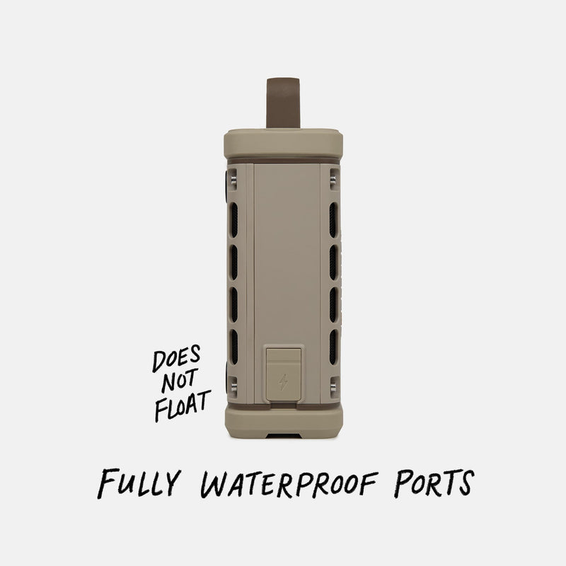 Studio shot of a Tan Ranger speaker calling out  the speaker does not float but does have fully waterproof ports. #base-color_tan