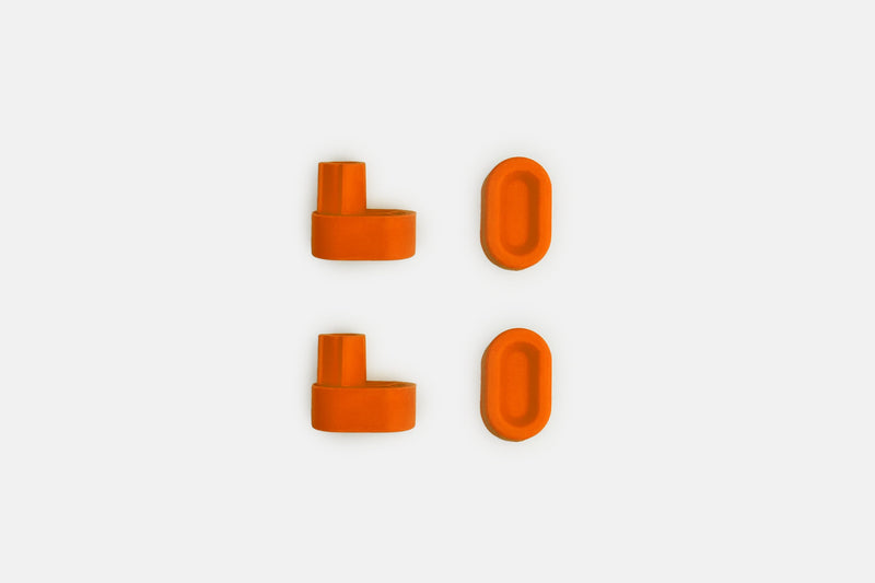 Studio photo showing the blaze orange rubber feet  on a white background #feet-color_blaze-orange