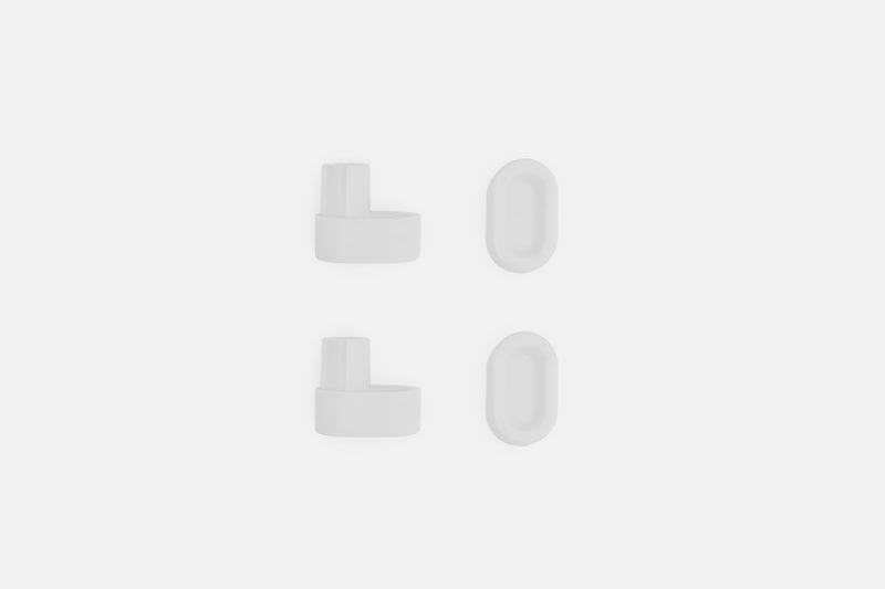 Studio photo showing the white rubber feet  on a white background #feet-color_white