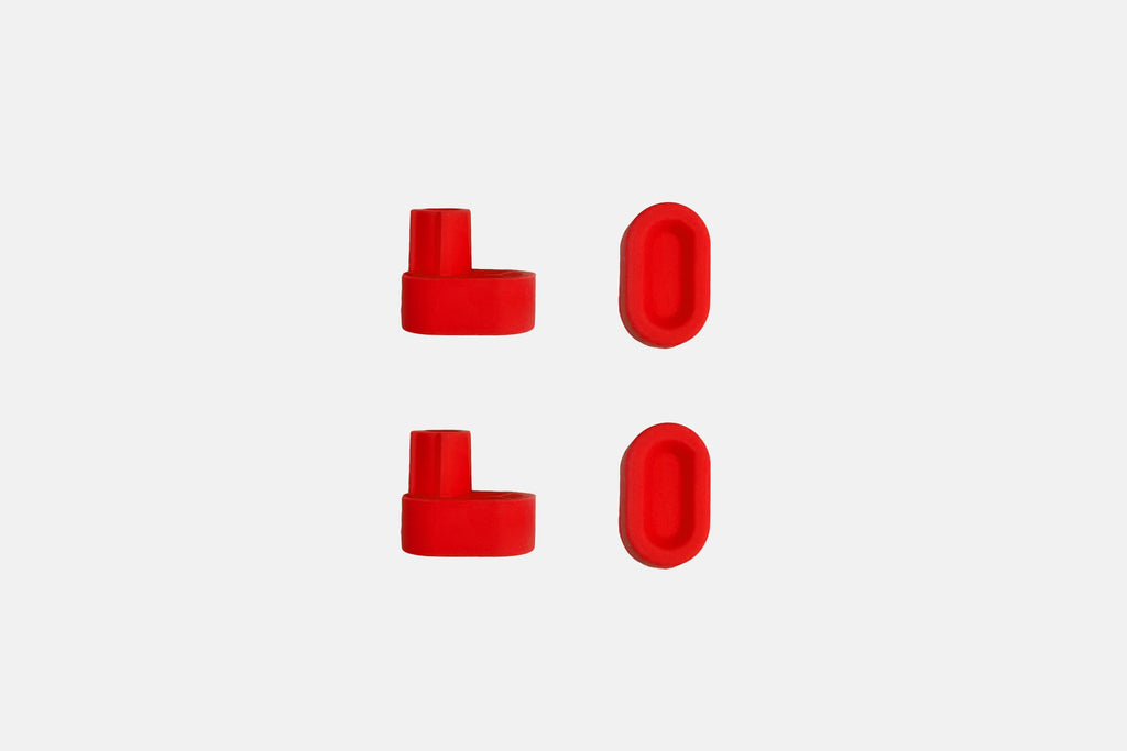 Studio photo showing the red rubber feet  on a white background #feet-color_red