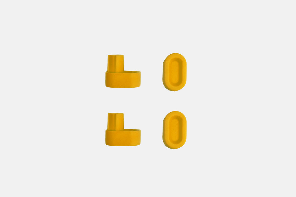 Studio photo showing the yellow rubber feet  on a white background #feet-color_yellow