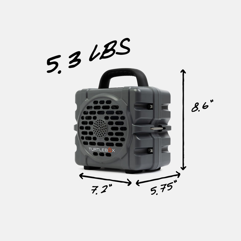 Gray portable speaker with measurements and weight label on a white background #base-color_gray